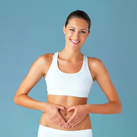 Woman in athletic wear smiles