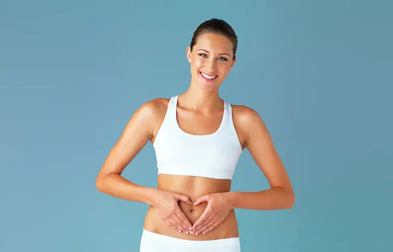 Woman in athletic wear smiles