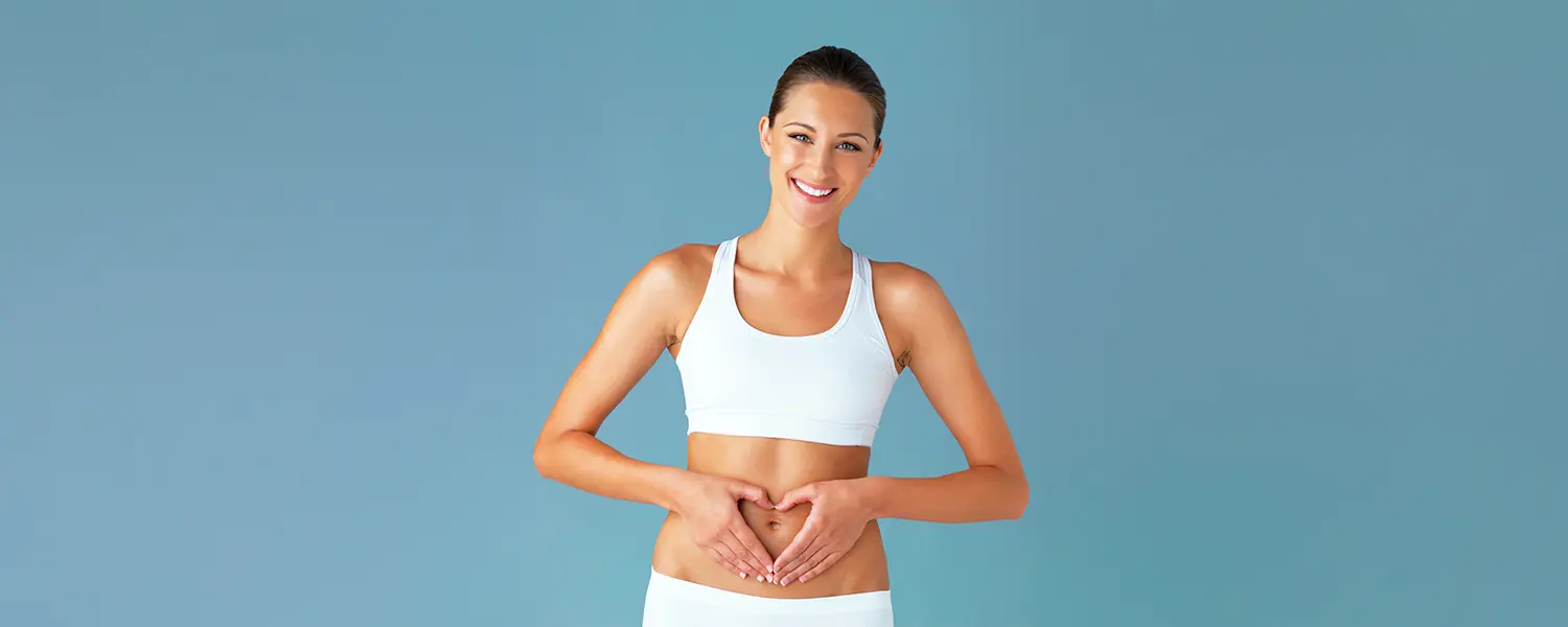 Woman in athletic wear smiles