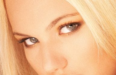Blonde person with blue eyes