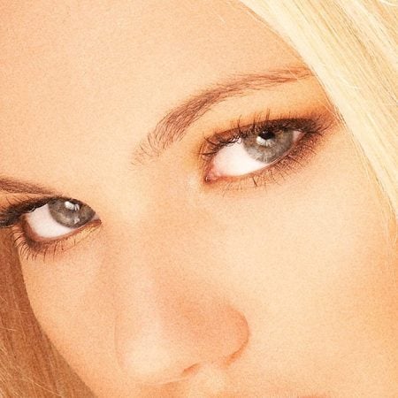 Blonde person with blue eyes