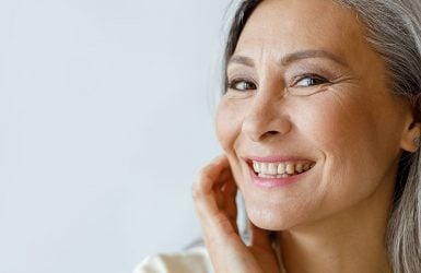 Gray-haired woman smiling